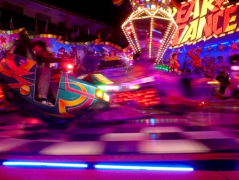 This photo of a twirling psychedelic ride at a country fair - Break Dance - was taken by photographer Konrad Mostert of Wuppertal, Germany.